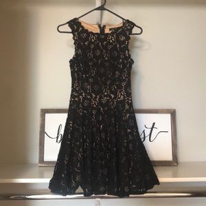 Black and nude laced dress.